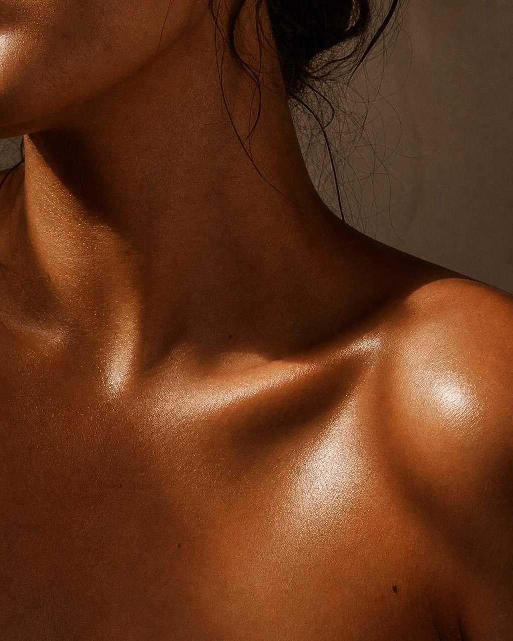 Warm editorial close-up of glowing skin — a moment of self care